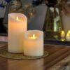 2 led kaarsen van dorsetto op goud kleurige onderzetter